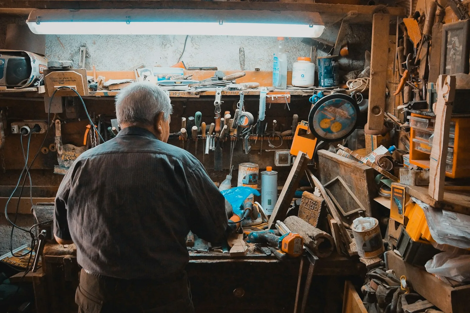 Sheet metal work being prepared at a metalworking bench